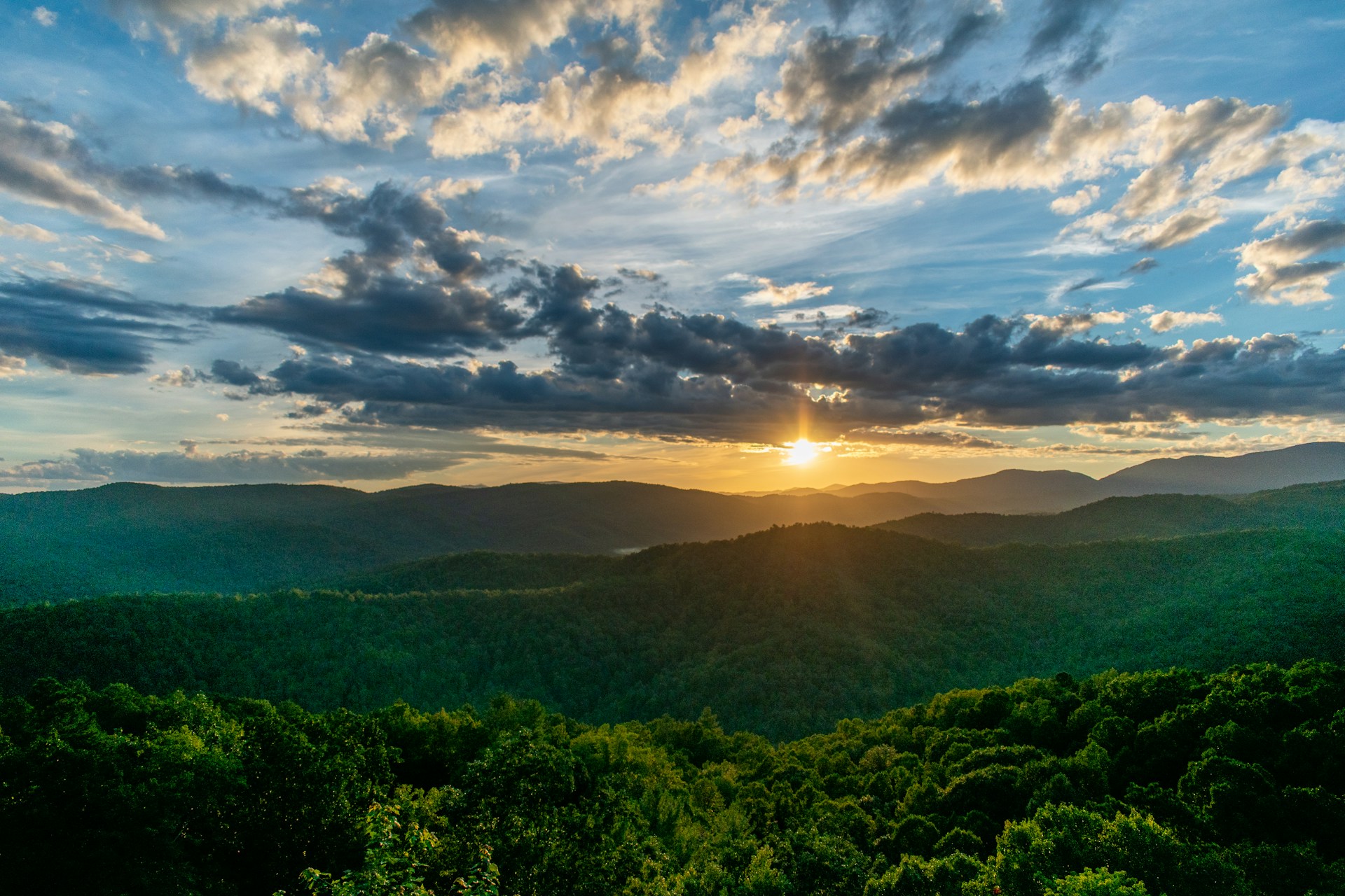 green mountains with sunrise