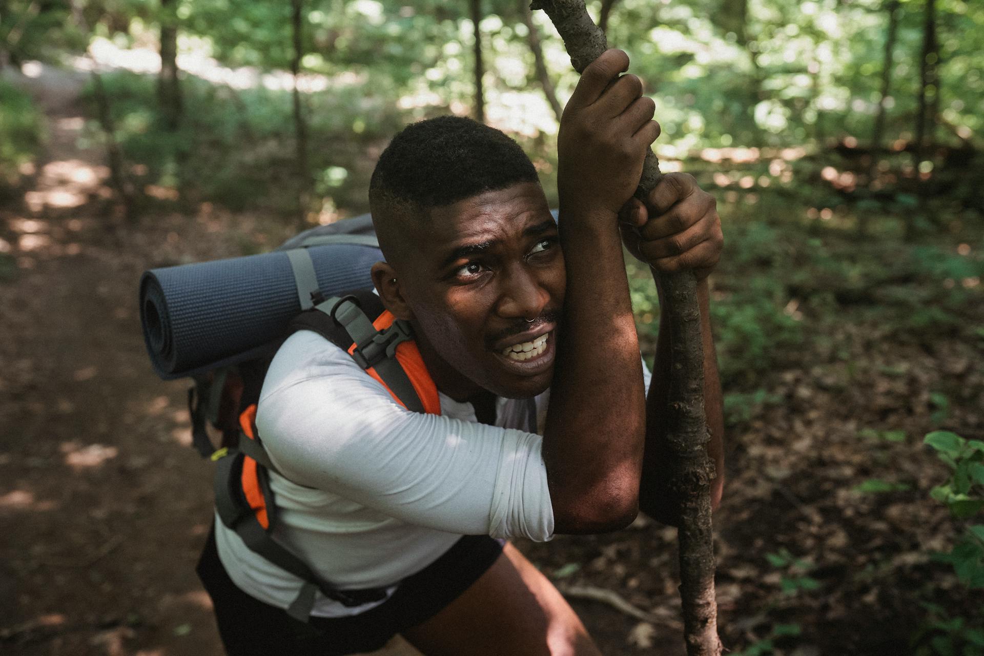 man tired from hike